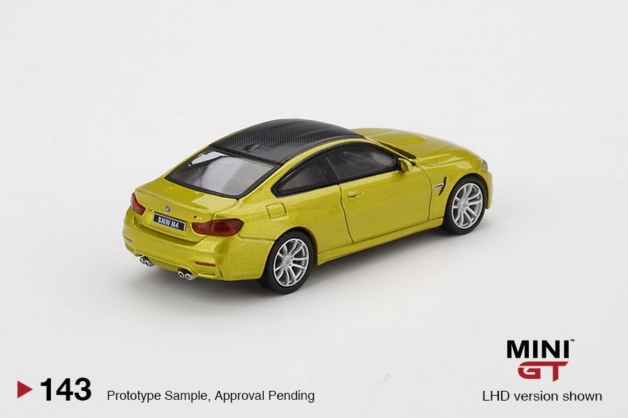 1/64 Mini GT #143 BMW M4 (F82) Austin Yellow Metallic Limited Edition mgt00143