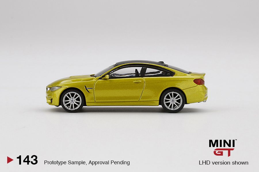 1/64 Mini GT #143 BMW M4 (F82) Austin Yellow Metallic Limited Edition mgt00143