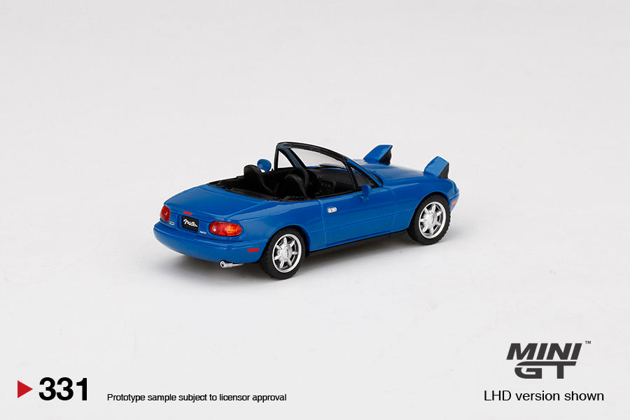 1:64 Mini GT #331 Mazda Miata MX-5 (NA) Headlight Up LHD Mariner Blue Limited Edition mgt00331