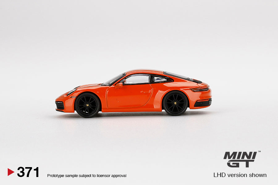 1:64 Mini GT #371 Porsche 911 (992) Carrera 4S Lava Orange Limited Edition MGT00371
