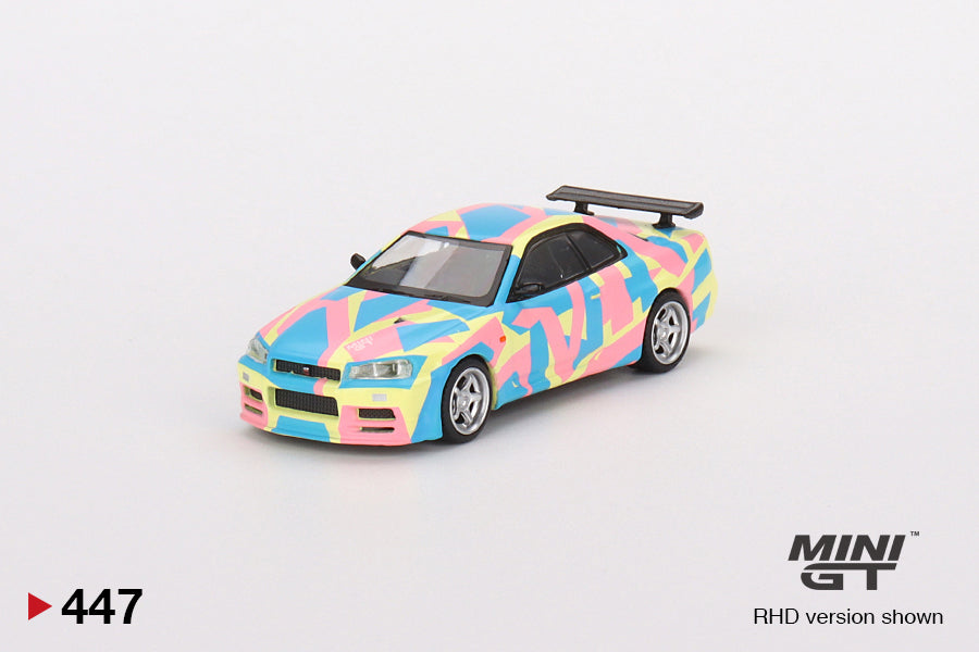 1:64 Mini GT #447 Nissan Skyline GT-R (R34)V-Spec ll MINI GT Digital Camouflage Yellow mgt00447