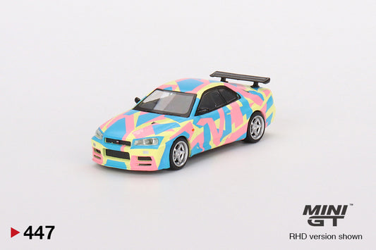 1:64 Mini GT #447 Nissan Skyline GT-R (R34)V-Spec ll MINI GT Digital Camouflage Yellow mgt00447