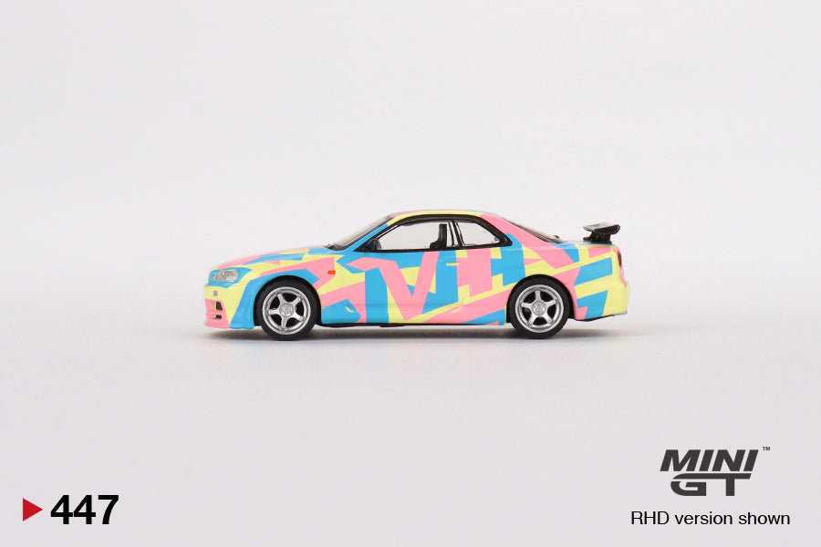 1:64 Mini GT #447 Nissan Skyline GT-R (R34)V-Spec ll MINI GT Digital Camouflage Yellow mgt00447