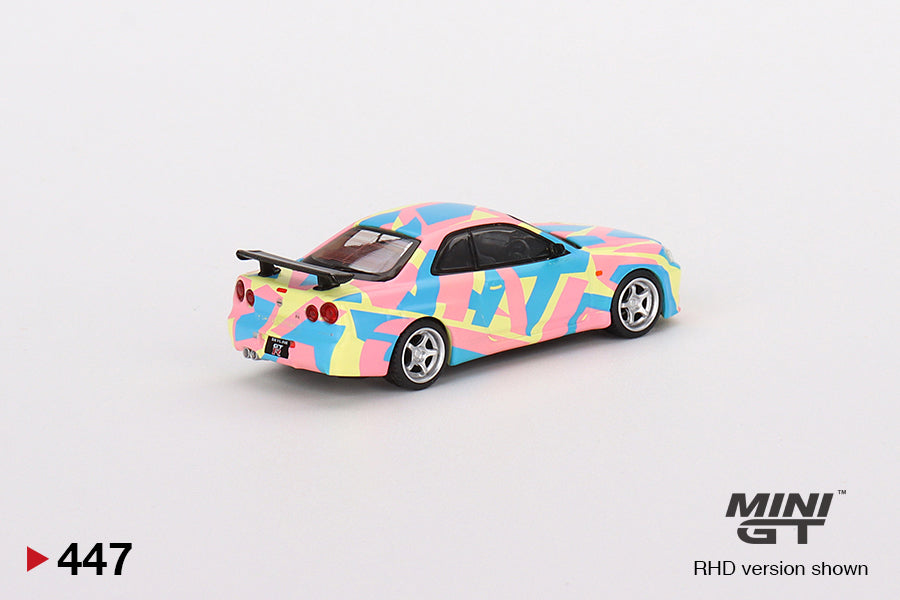 1:64 Mini GT #447 Nissan Skyline GT-R (R34)V-Spec ll MINI GT Digital Camouflage Yellow mgt00447