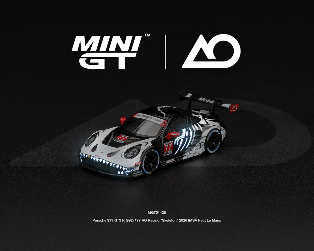 Pre-Order | 1:64 Mini GT #1436 Porsche 911 GT3 R (992) #77 AO Racing “Skeleton Rexy” 2026 IMSA Petit Le Mans – (Glow in the Dark) Limited Edition MGT01436