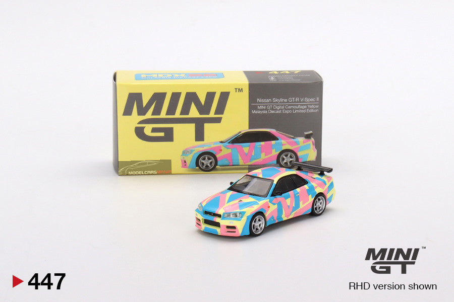 1:64 Mini GT #447 Nissan Skyline GT-R (R34)V-Spec ll MINI GT Digital Camouflage Yellow mgt00447